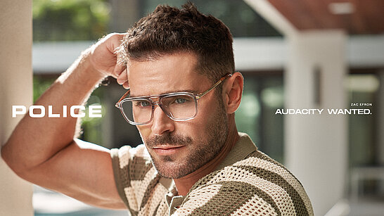 Zac Efron mit einer Police Brille